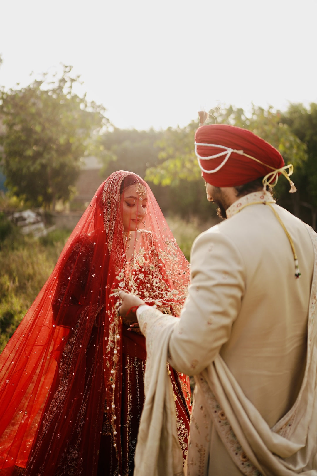 Dream Red Lehenga with a veil AMRINSAHI
